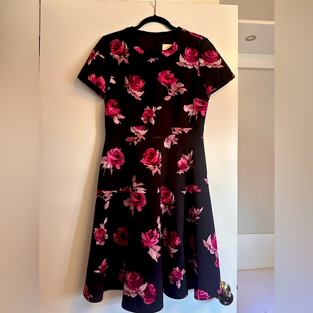 Black floral Dress. A-line shape with a nipped in waist is flattering.
